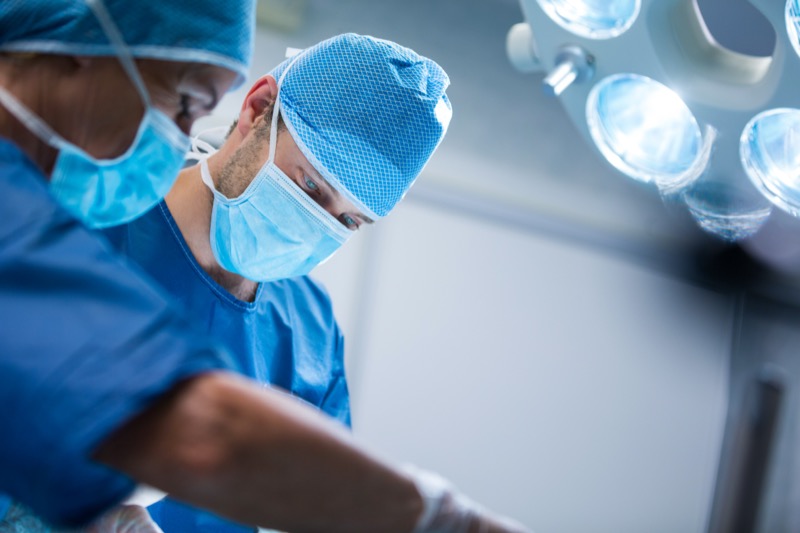 Surgeons performing an operation